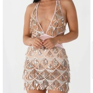 Start a riot sequin dress.  New